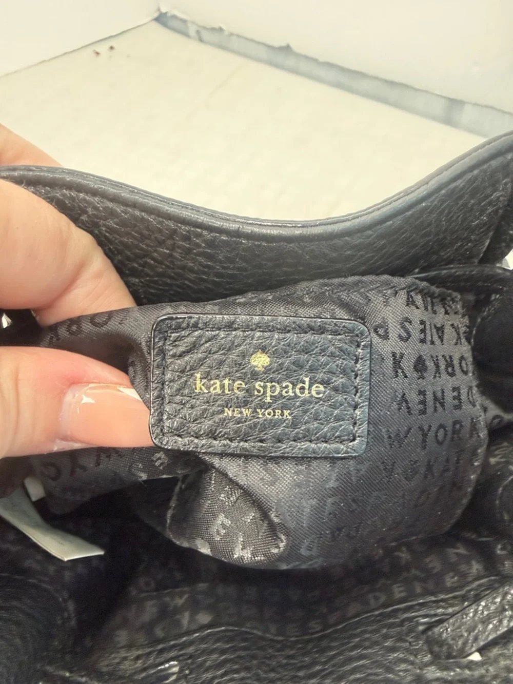 Kate Spade New York drawstring bucket bag, from the Grey Street  Tiny Cooper